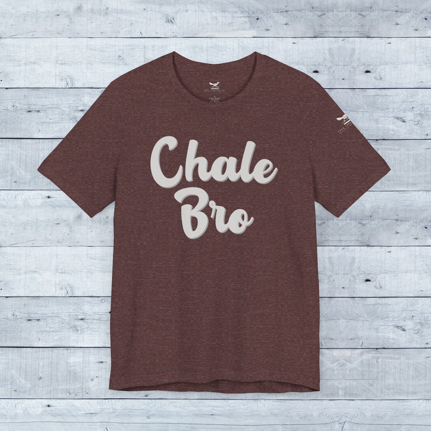 Heather maroon tri-blend tee with white "Chale Bro" playful slogan in casual relaxed fit.
