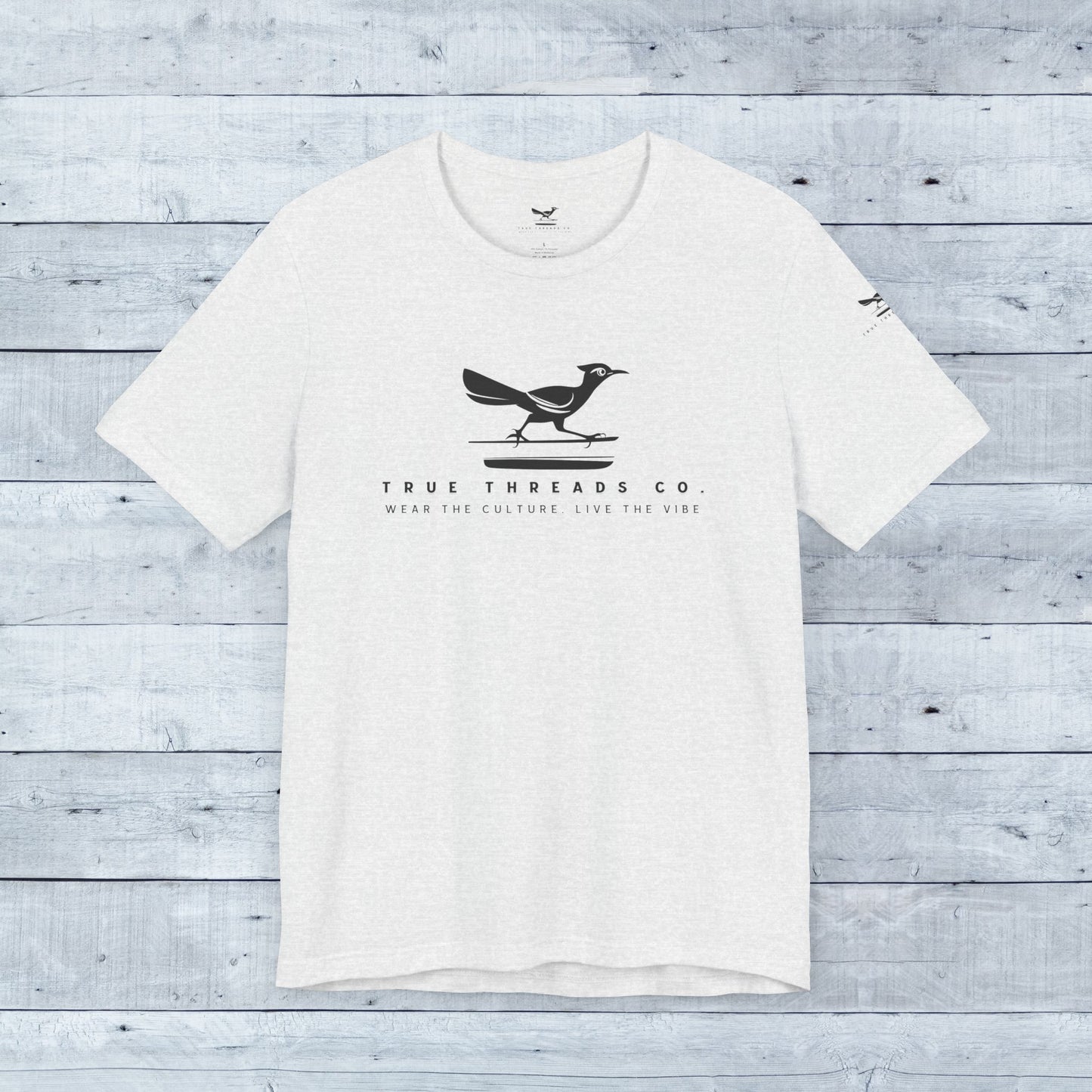 True Threads Classic Tee featuring a bird design, crafted from soft tri-blend fabric. Unisex fit ideal for active wear and everyday comfort.