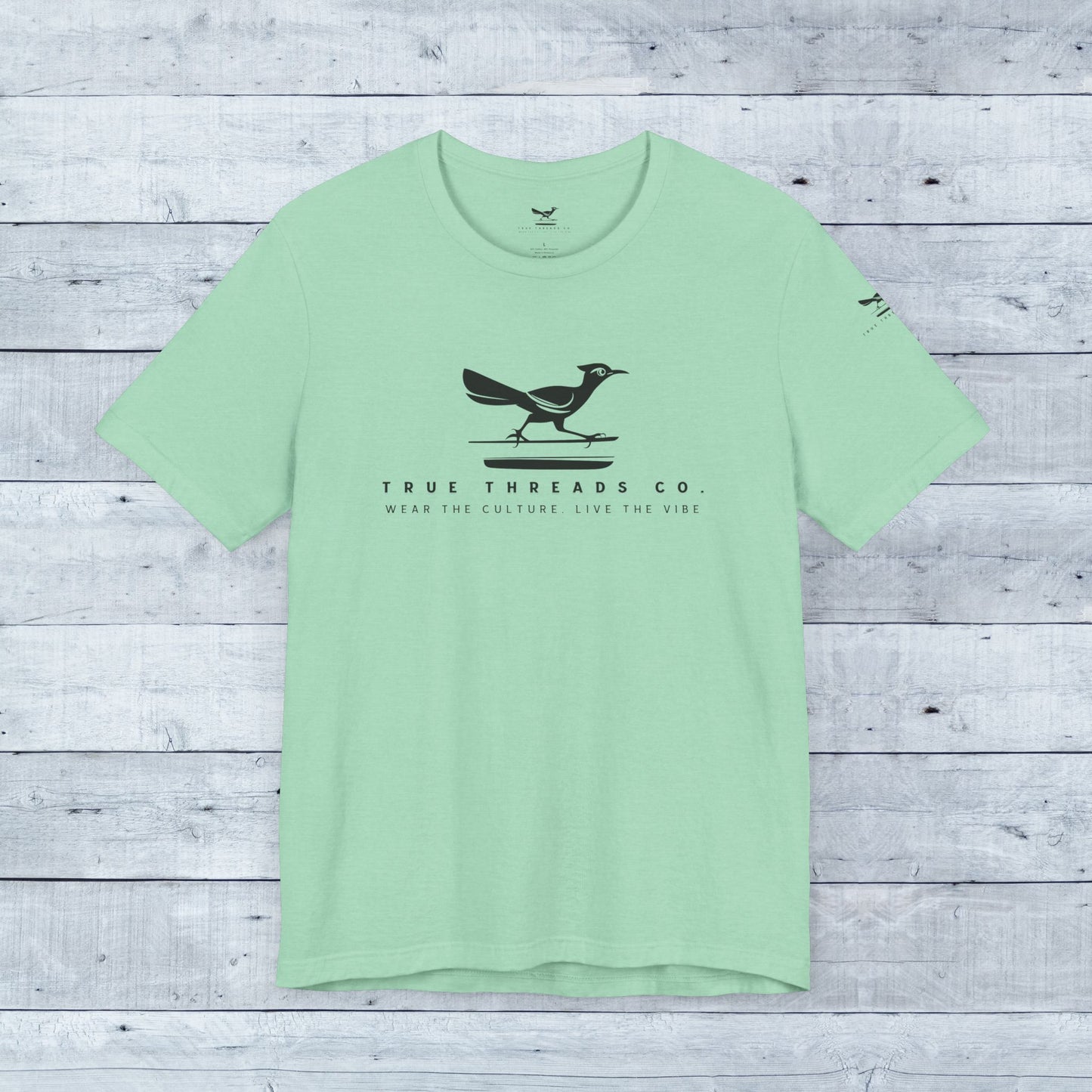 True Threads Classic Tee (Light Colors) featuring a bird design, showcasing ultra-soft tri-blend fabric and a relaxed unisex fit for everyday comfort.