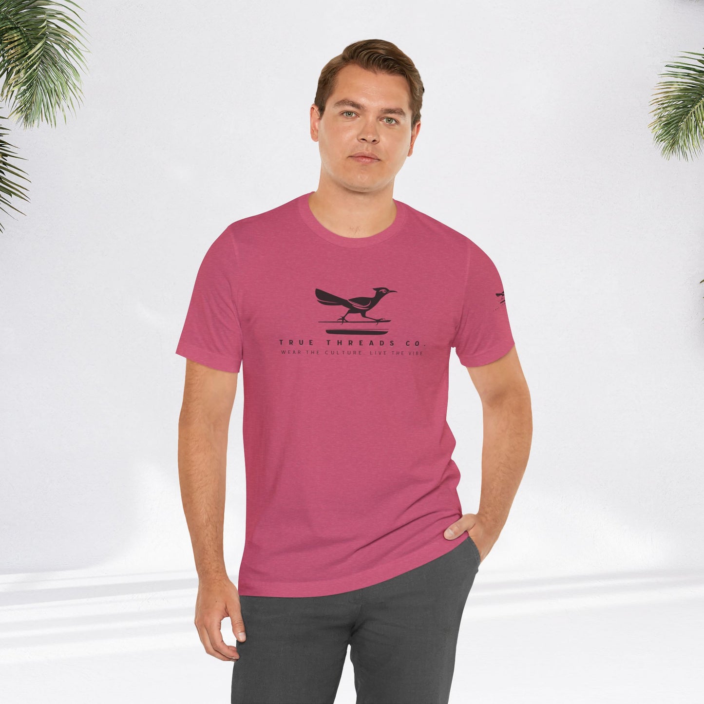True Threads Classic Tee, worn by a man near palm trees, showcases a relaxed fit and soft fabric, ideal for comfort and style.