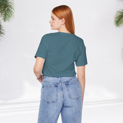 Heather deep teal relaxed fit tee paired with light blue high-waisted jeans viewed from back.