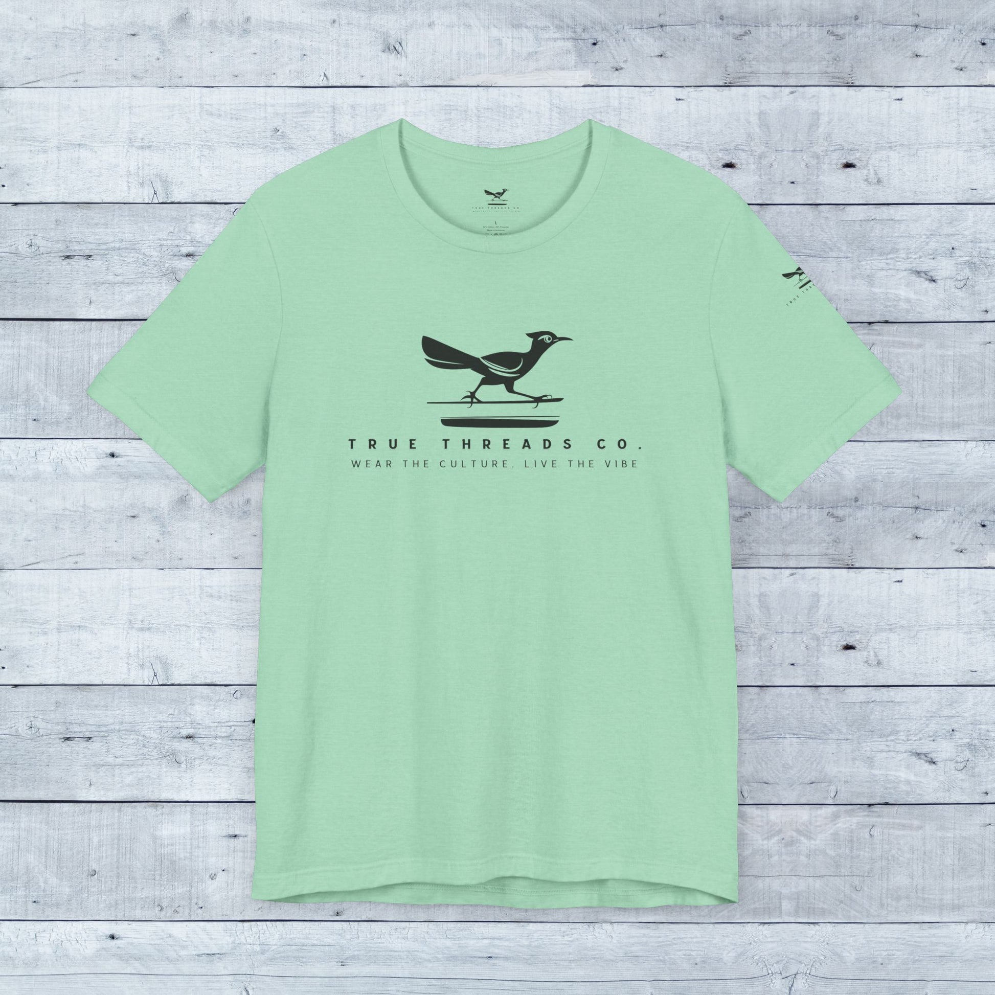True Threads Classic Tee (Light Colors) featuring a bird design, showcasing ultra-soft tri-blend fabric and a relaxed unisex fit for everyday comfort.